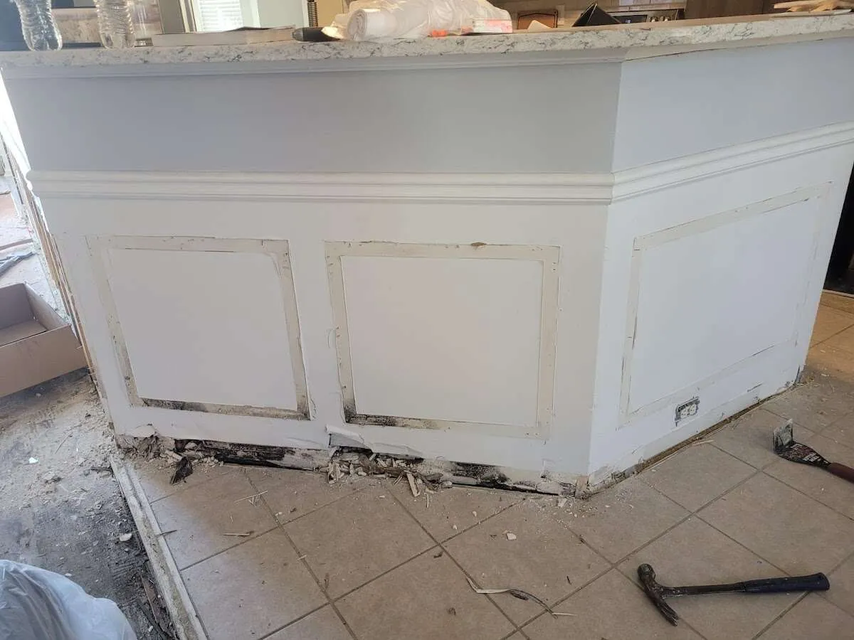 Water damage and mold on kitchen during Storm Damage Restoration in Hernando
